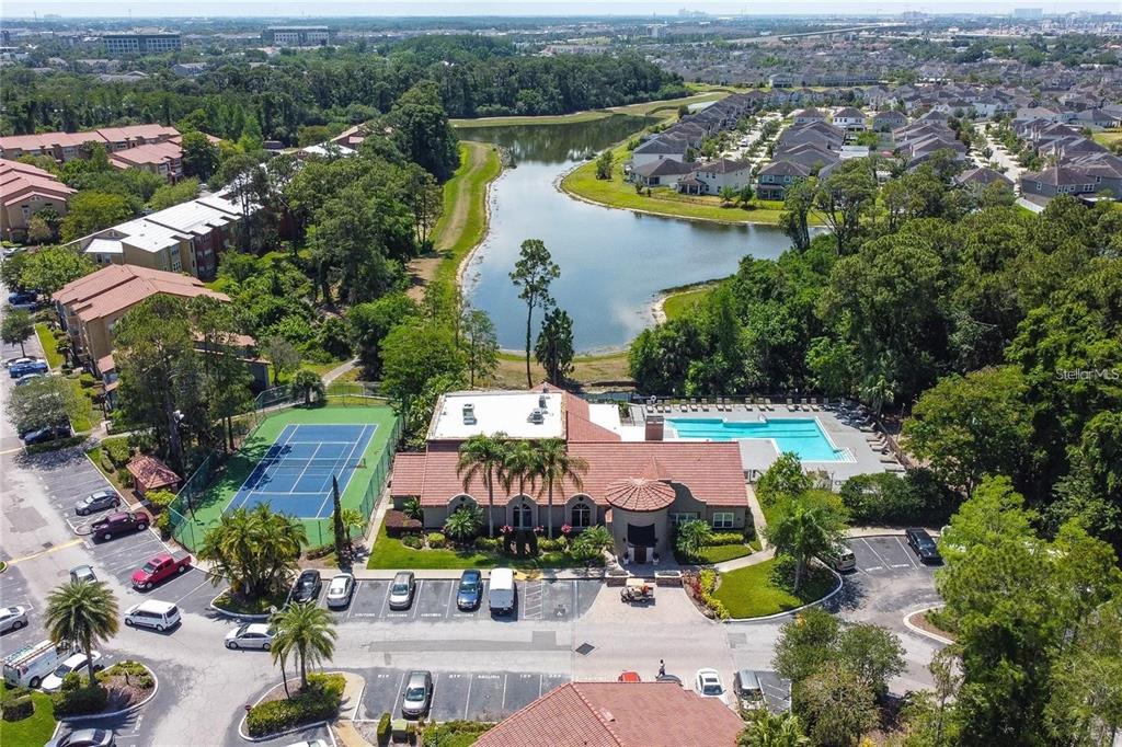 5120 Conroy Road, Unit 18 Orlando, FL 32811 - Photo 30 of 38 an aerial view of residential houses with outdoor space and lake view
