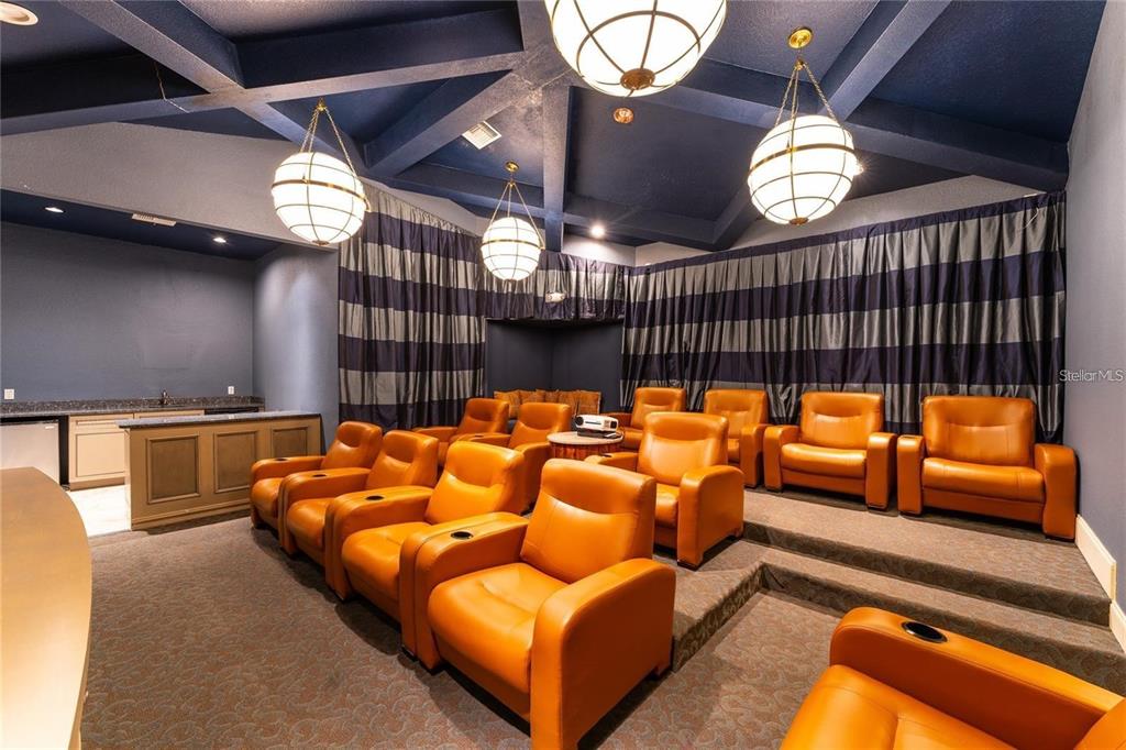 5120 Conroy Road, Unit 18 Orlando, FL 32811 - Photo 31 of 38 a reading room with furniture and a chandelier