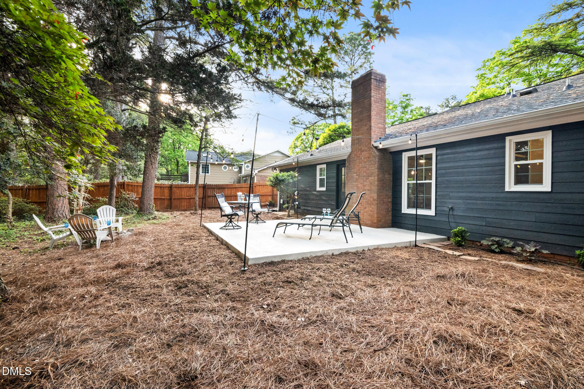 3509 Morningside Drive Raleigh, NC 27607 - Photo 43 of 49 a view of a house with backyard and a tree
