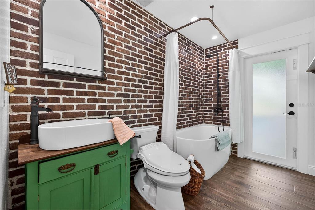 11945 74th Avenue Seminole, FL 33772 - Photo 25 of 47 a bathroom with a sink toilet and shower