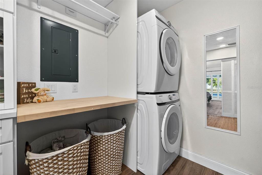 11945 74th Avenue Seminole, FL 33772 - Photo 30 of 47 a bathroom with a sink a mirror and a bathtub