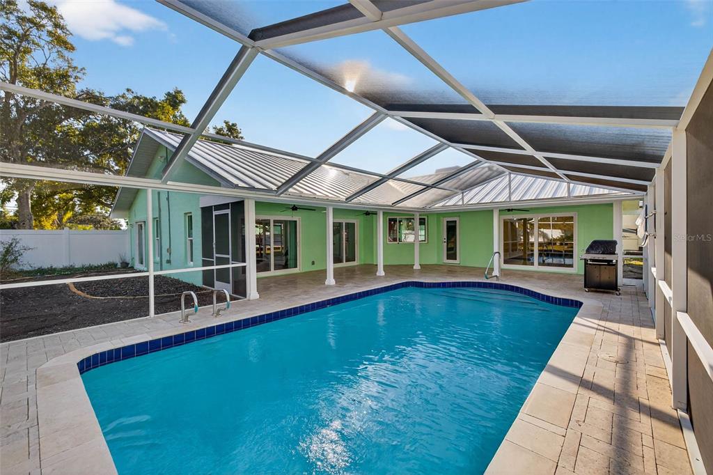 11945 74th Avenue Seminole, FL 33772 - Photo 34 of 47 a view of swimming pool with seating space