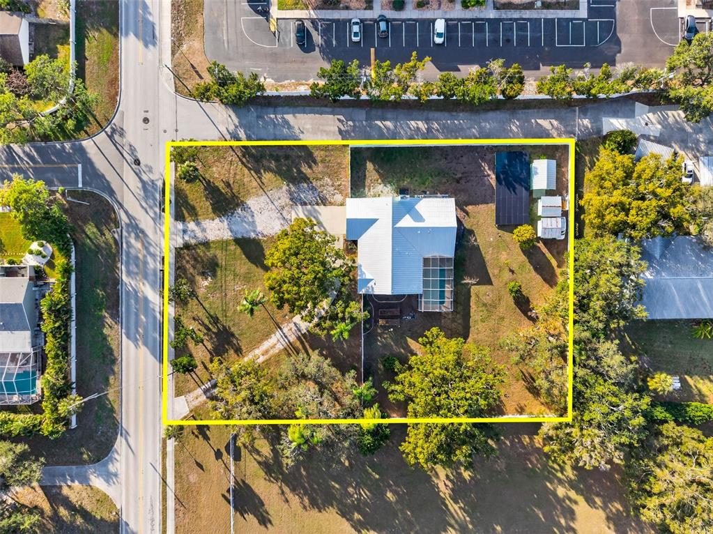 11945 74th Avenue Seminole, FL 33772 - Photo 44 of 47 aerial view of a house with a swimming pool