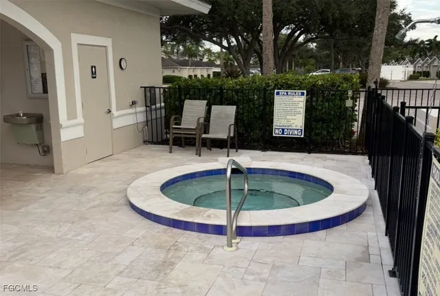 a table tennis table sitting in backyard of a house