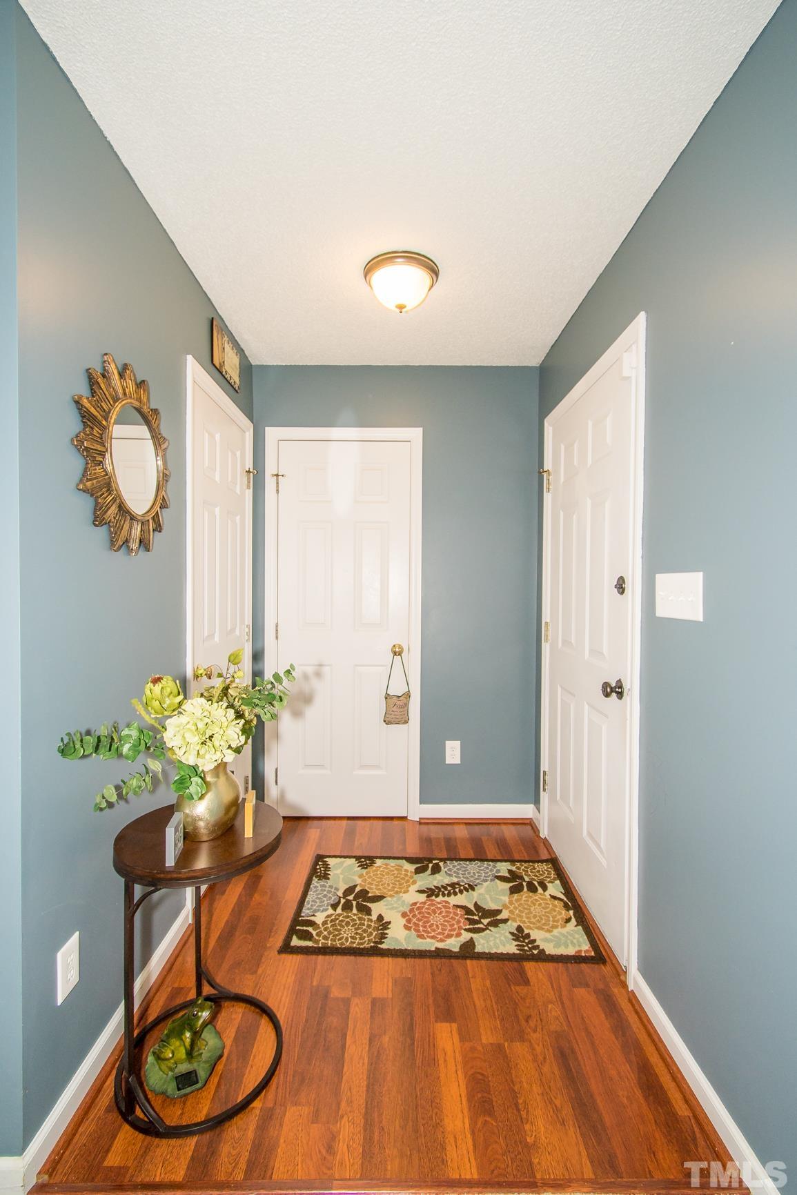 561 Yellow Berry Run Wendell, NC 27591 - Photo 21 of 27 a view of a room with wooden floor and chair