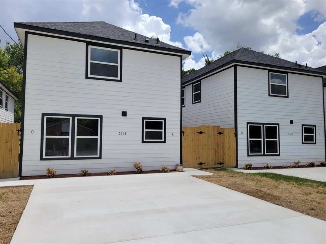 a house view with a backyard space
