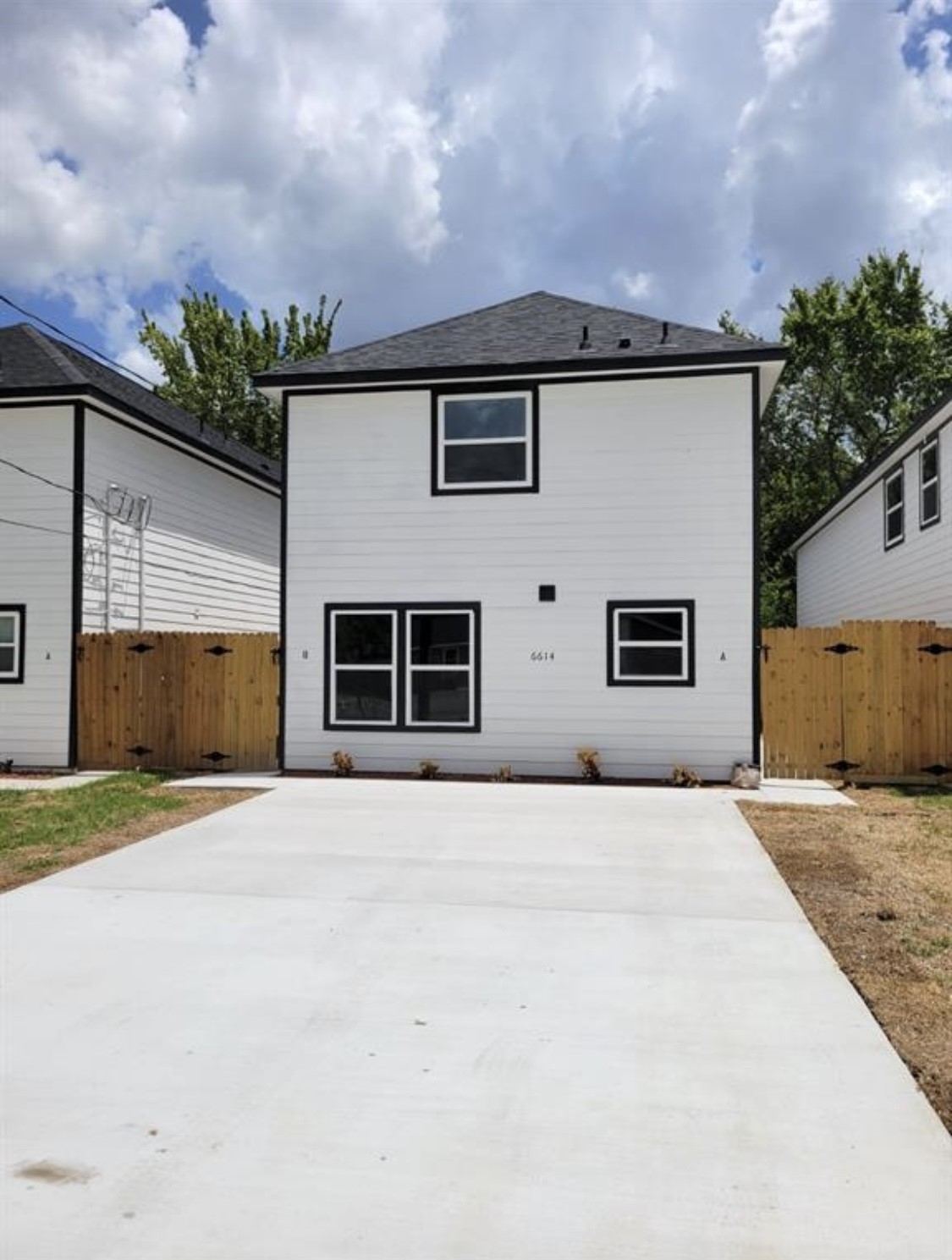 6614 Haight Street, Unit B Houston, TX 77028 - Photo 2 of 10 a front view of a house with a garage