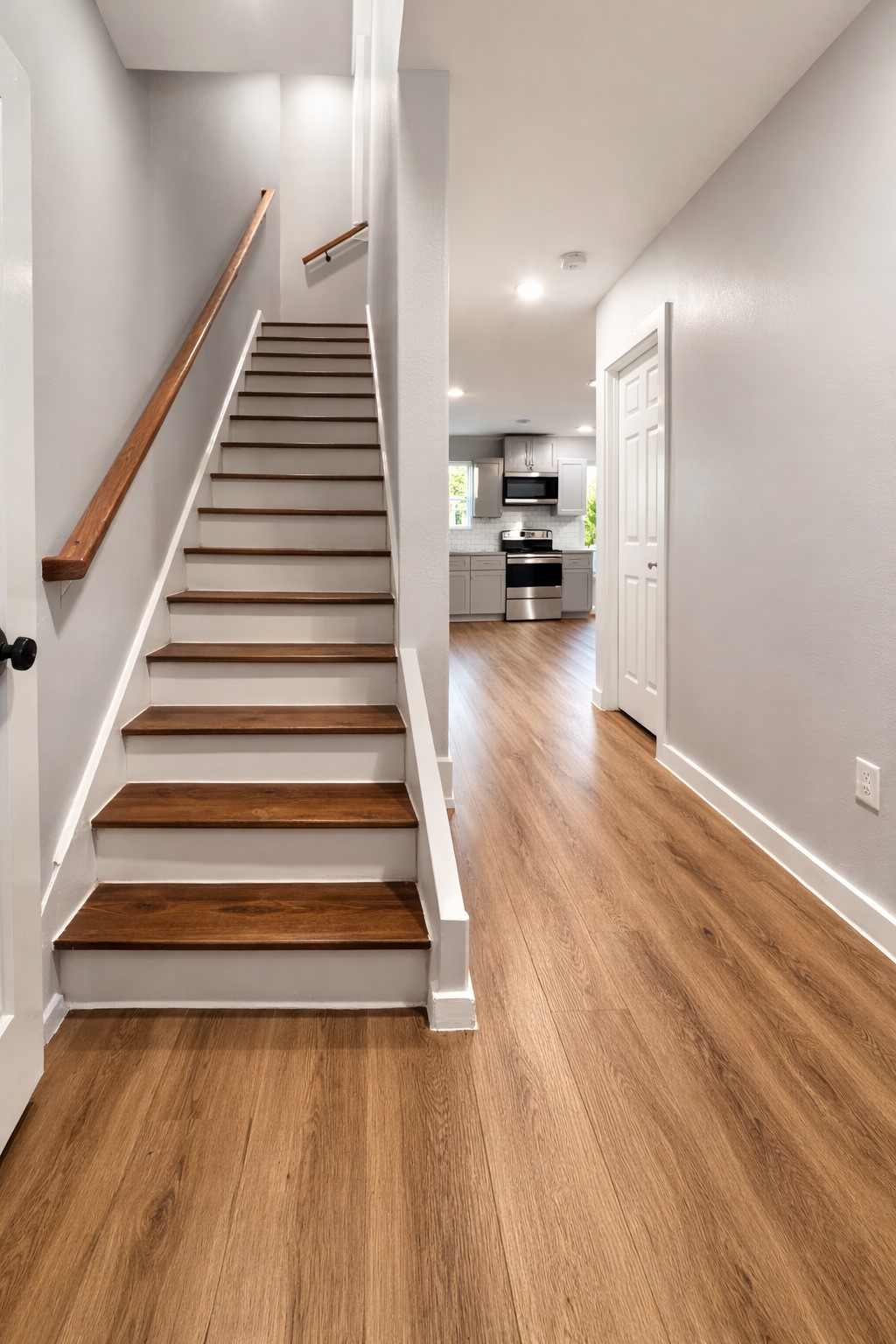 6614 Haight Street, Unit B Houston, TX 77028 - Photo 6 of 10 a view of entryway and hall with wooden floor