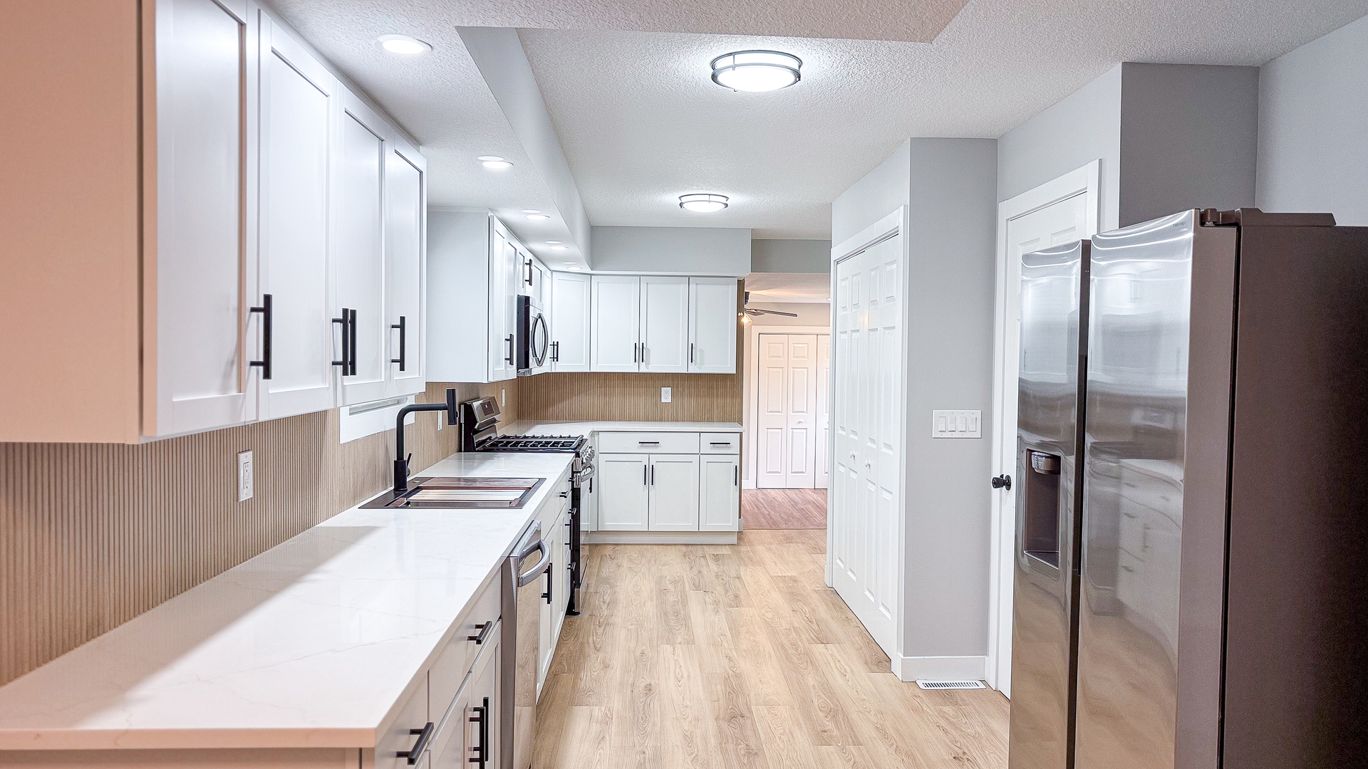 103 2nd Street Broadlands, IL 61816 - Photo 13 of 55 a large kitchen with a lot of counter space and a refrigerator