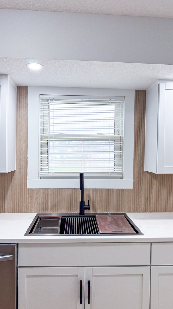 103 2nd Street Broadlands, IL 61816 - Photo 15 of 55 a kitchen with a sink cabinets and window