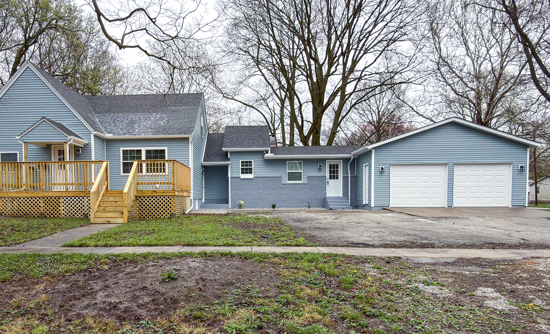 103 2nd Street Broadlands, IL 61816 - Photo 2 of 55 a view of a house with a yard and large tree