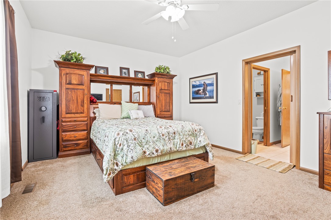 4222 Ramsey Road Springfield, OH 45502 - Photo 49 of 79 This cozy bedroom features plush carpeting and a convenient en-suite bathroom for ultimate comfort.