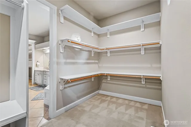 a view of an empty walk in closet