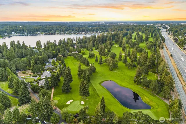 a view of a lake with a yard