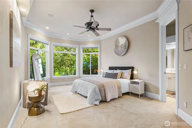 a bedroom with bed and window