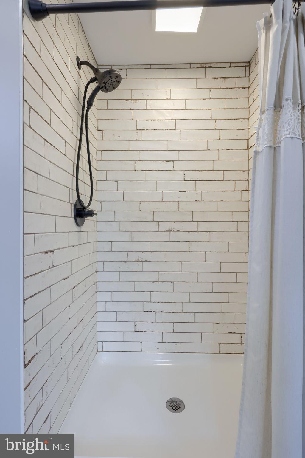 1709 Ridgeview Avenue Lancaster, PA 17603 - Photo 31 of 77 Sleek shower with modern tile design.