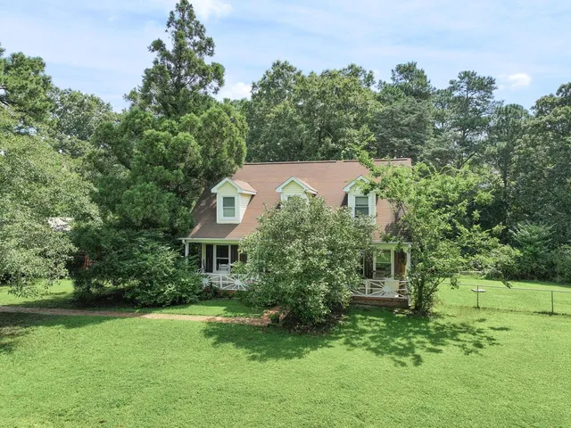 a view of a yard with a trees