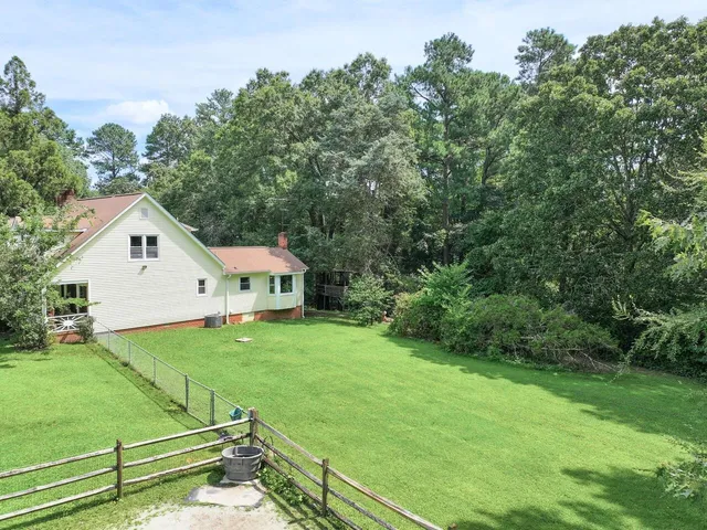 a view of a house with a park