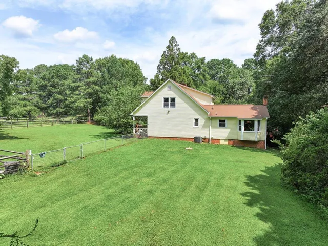 a view of a bench in a park