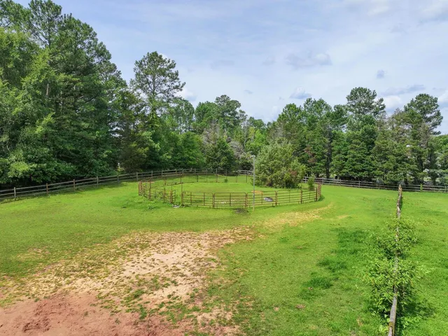 a view of a lake with a big yard