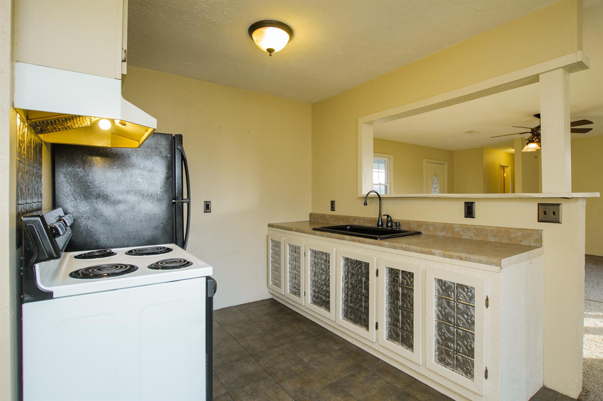 6012 Henry Road Springfield, TN 37172 - Photo 8 of 30 a kitchen that has a sink and a stove
