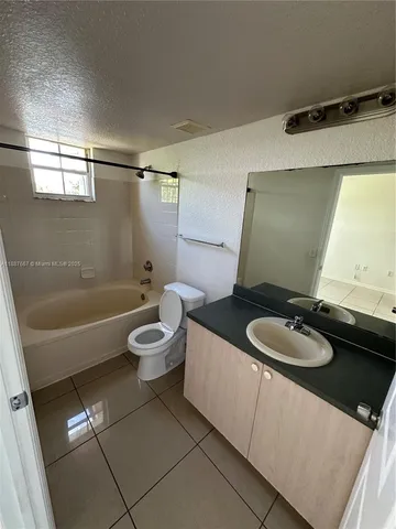 a house view with a outdoor space