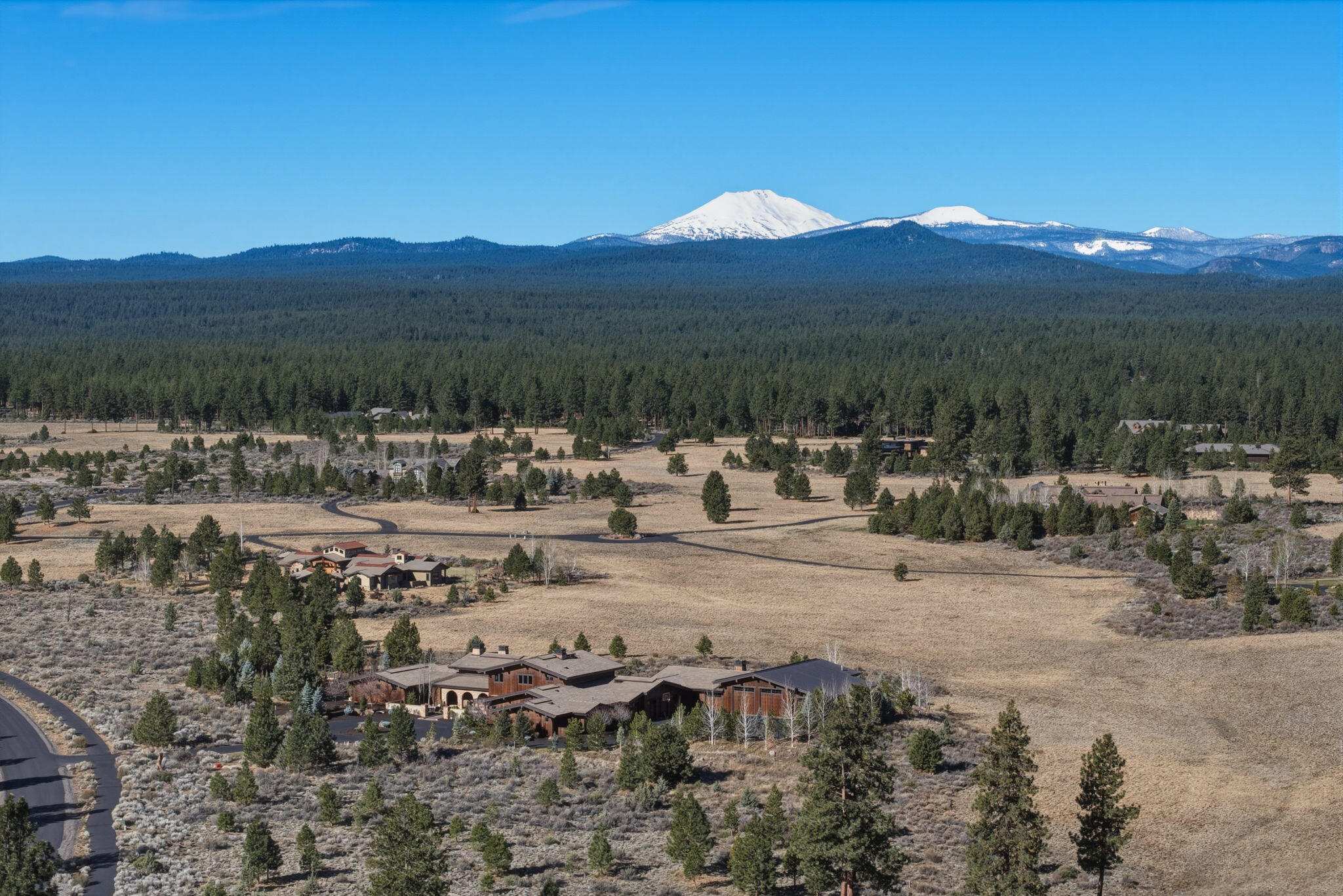 19100 Macalpine Loop Bend, OR 97702 - Photo 55 of 56 Aerial view of Estate, the Cascade Mountains and the surrounding landscape