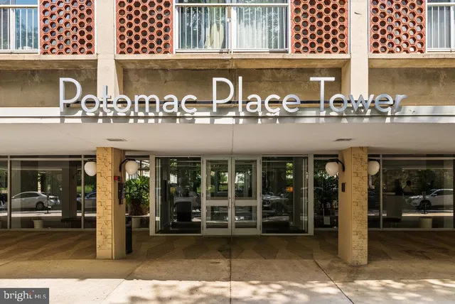 a front view of a building with glass windows