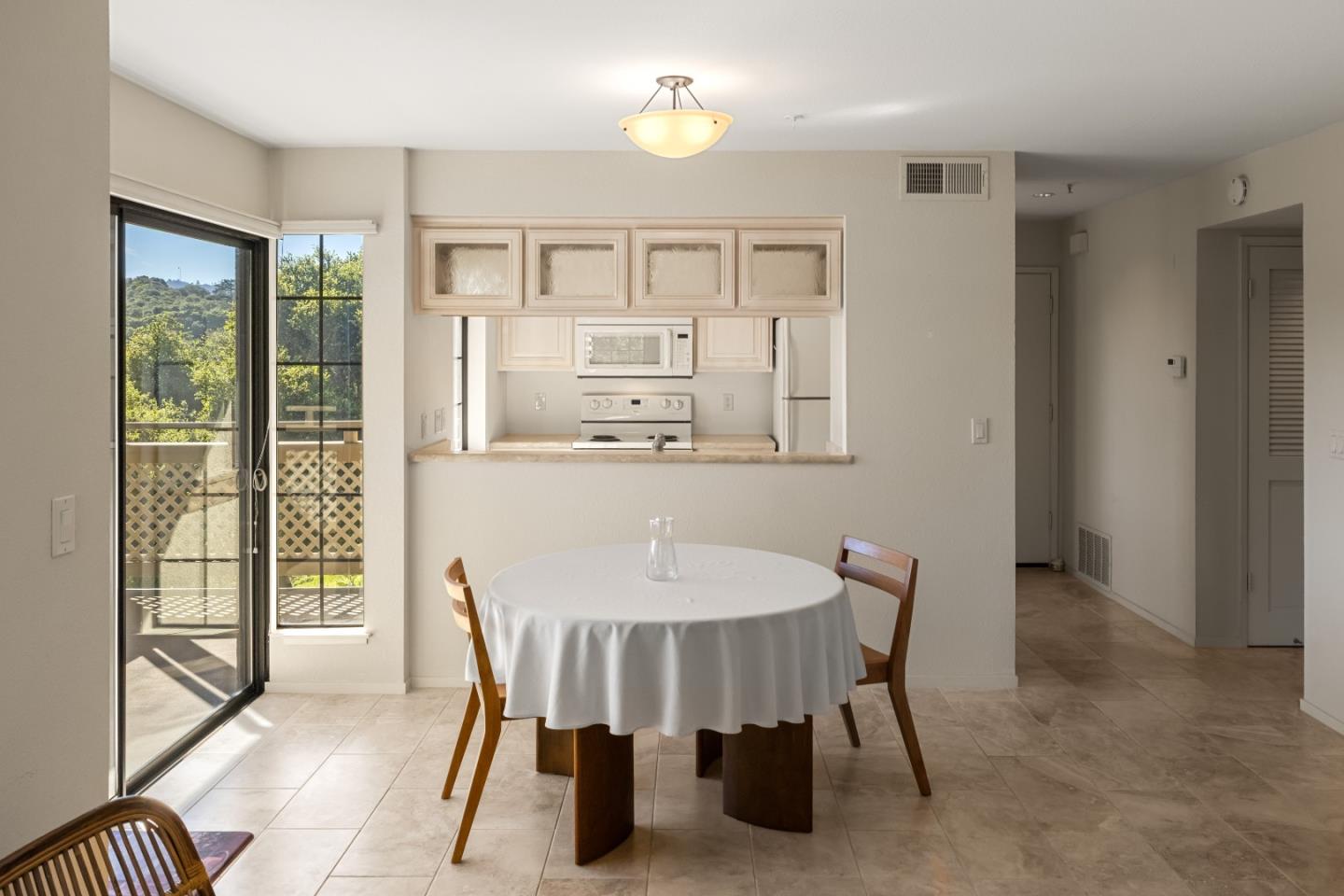 121 Quail Run Court Del Rey Oaks, CA 93940 - Photo 10 of 33 a dining room with furniture and window