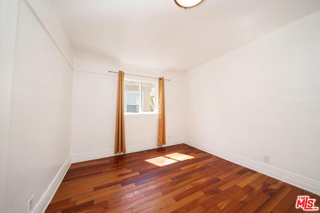 3714 West Pico Boulevard Los Angeles, CA 90019 - Photo 13 of 45 a view of empty room with wooden floor