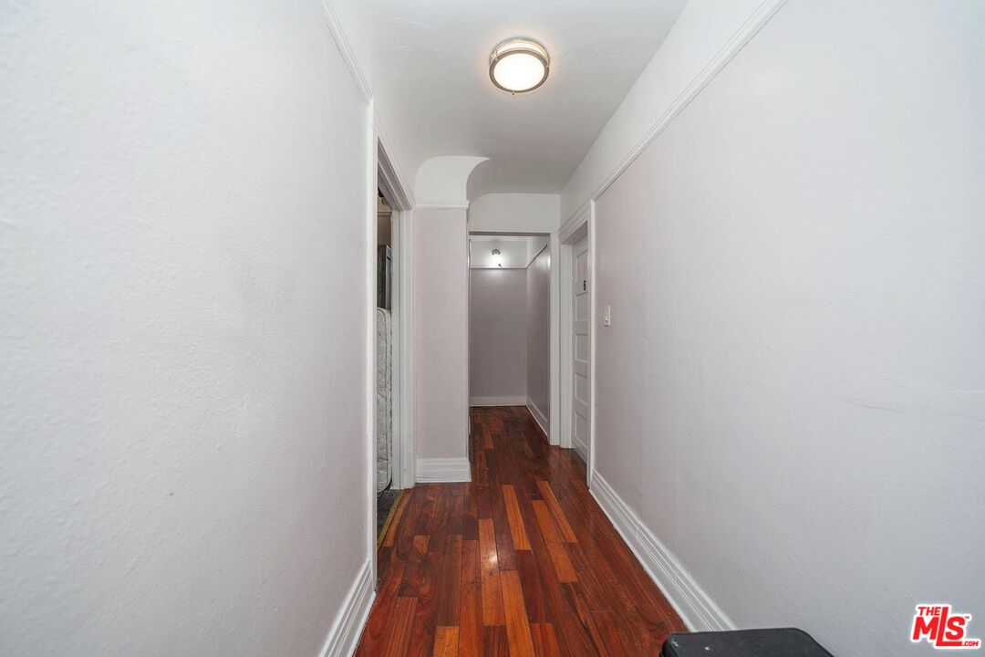 3714 West Pico Boulevard Los Angeles, CA 90019 - Photo 17 of 45 a view of a hallway with wooden floor