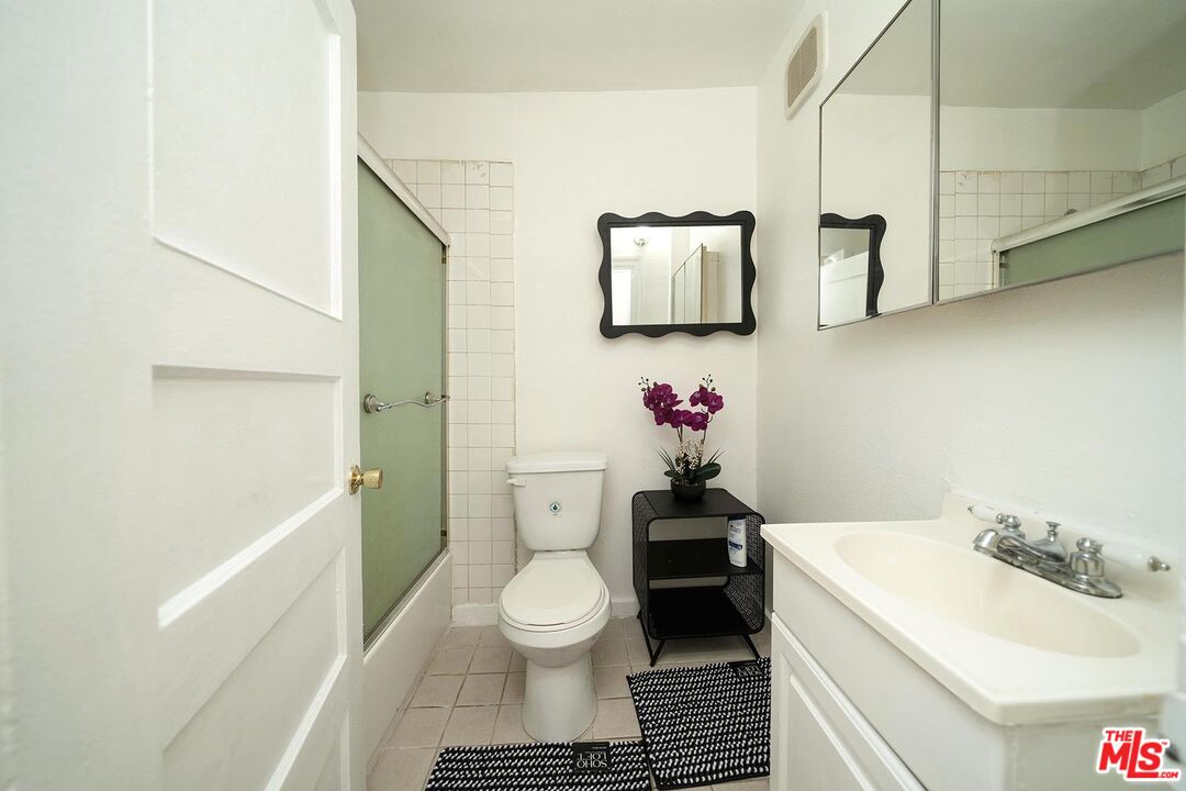 3714 West Pico Boulevard Los Angeles, CA 90019 - Photo 31 of 45 a bathroom with a sink toilet and shower