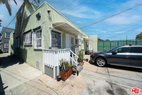 a view of a backyard of the house