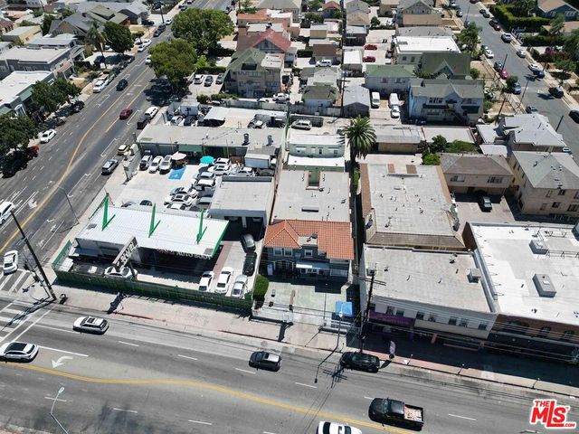 an aerial view of residential house with parking space