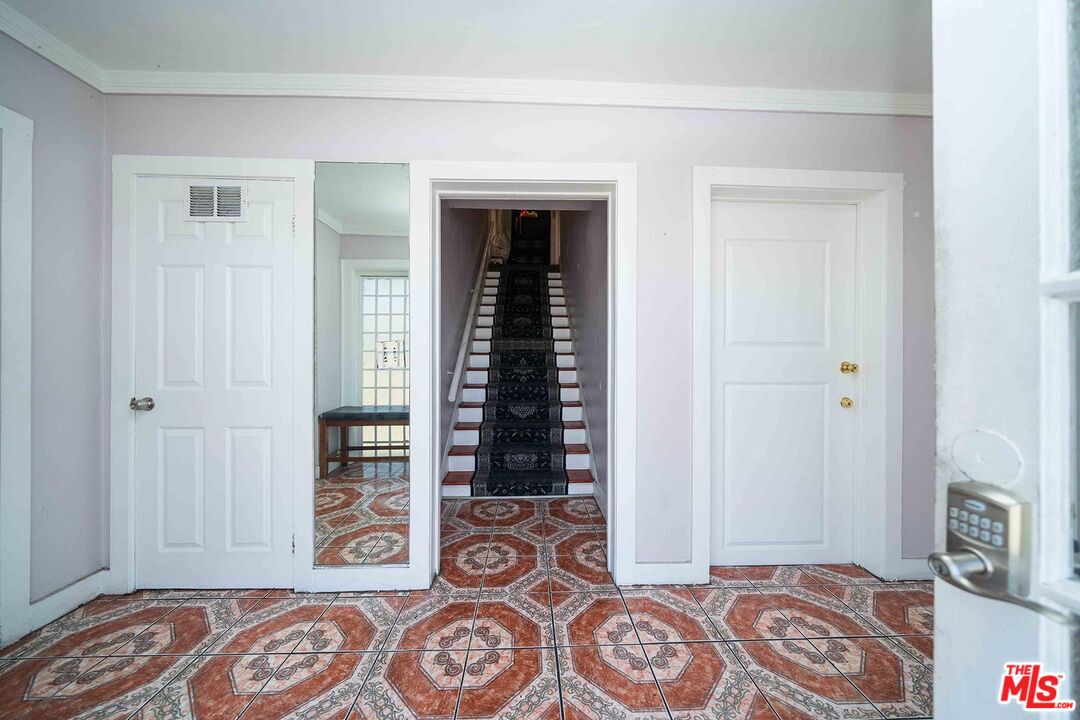 3714 West Pico Boulevard Los Angeles, CA 90019 - Photo 8 of 45 a view of an empty room with window and wooden floor