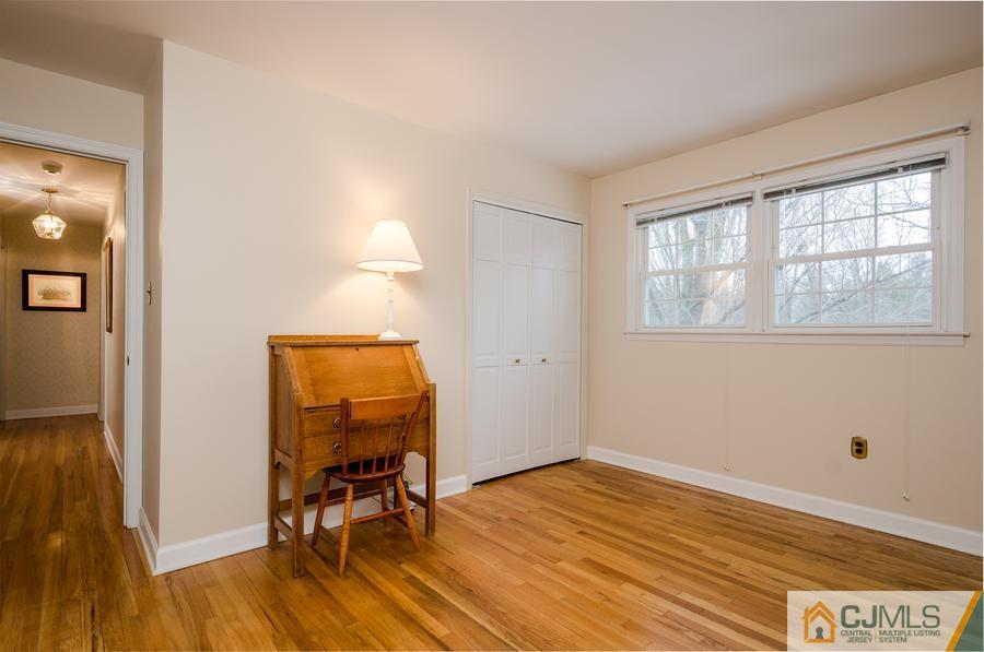 14 Fairfield Road Princeton, NJ 08540 - Photo 18 of 24 wooden floor in an empty room with a window