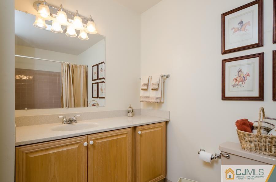 14 Fairfield Road Princeton, NJ 08540 - Photo 20 of 24 a bathroom with a sink and a mirror