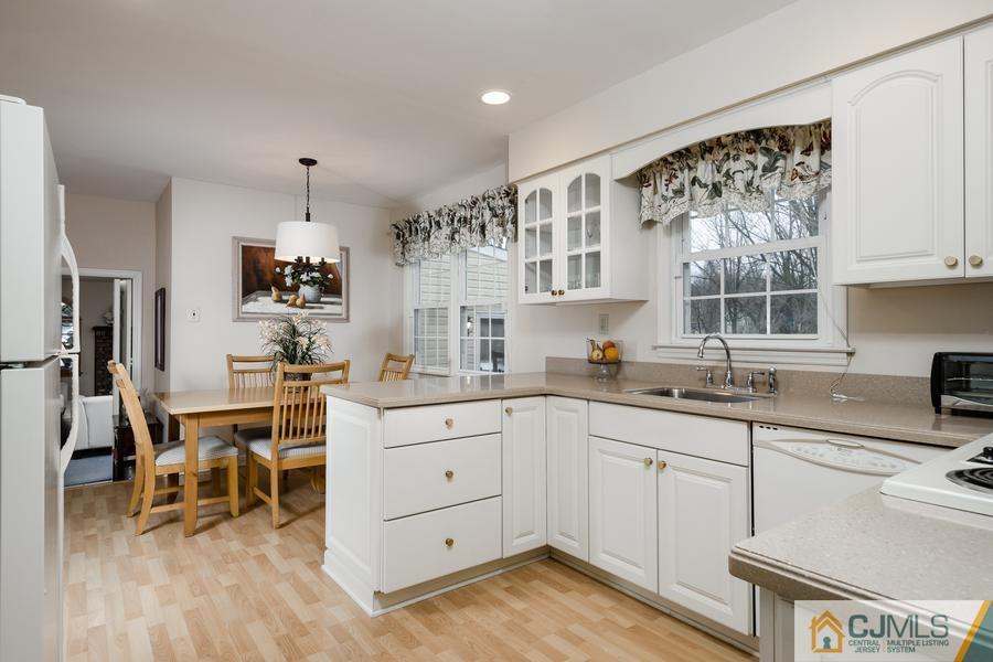 14 Fairfield Road Princeton, NJ 08540 - Photo 8 of 24 a kitchen with a sink window and cabinets
