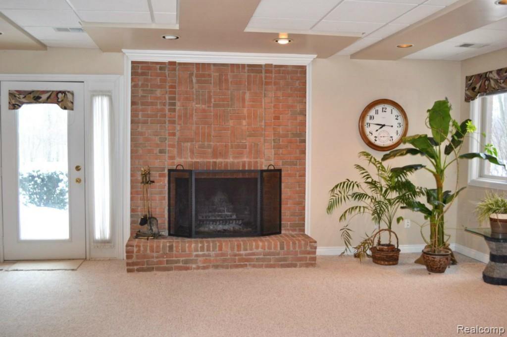 3609 Cedar Brook Drive Rochester, MI 48309 - Photo 23 of 27 Fireplace And Walkout