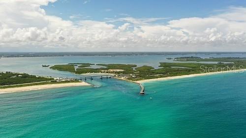 67 Alberta Avenue Ponce Inlet, FL 32127 - Photo 17 of 17 a view of a water with an outdoor space