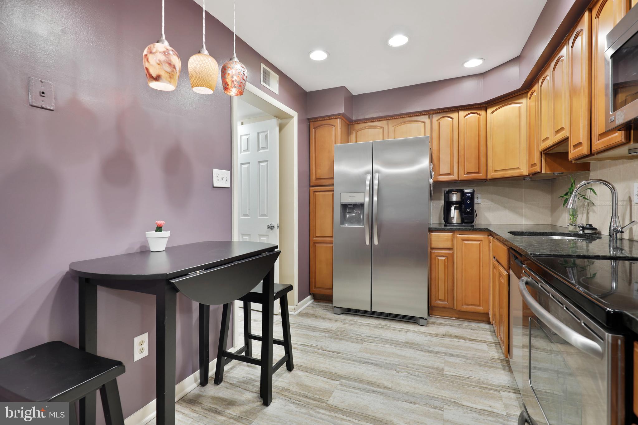 5755 Thunder Hill Road Columbia, MD 21045 - Photo 18 of 32 New Stainless Refrigerator