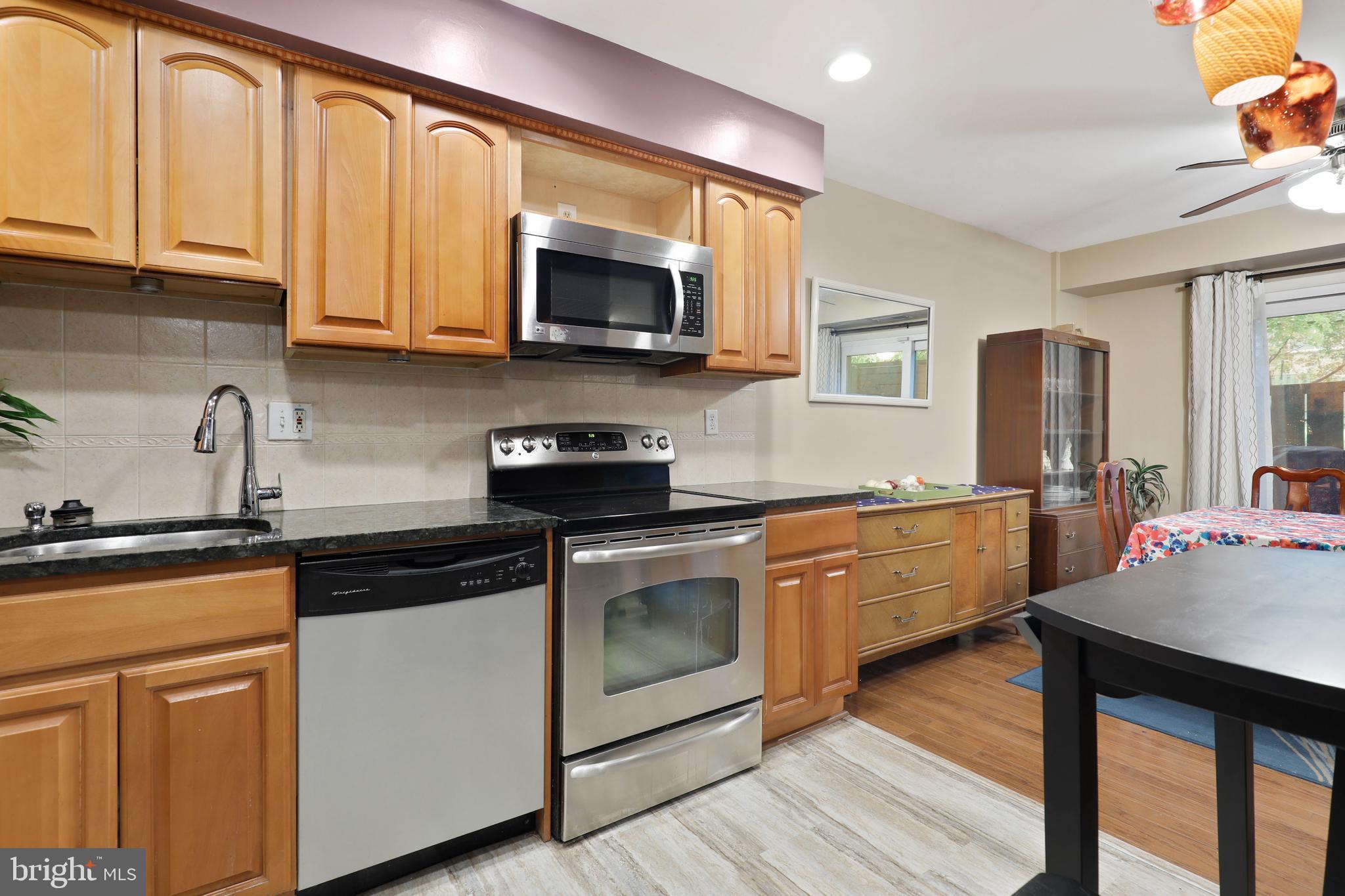 5755 Thunder Hill Road Columbia, MD 21045 - Photo 19 of 32 New Stove and Microwave