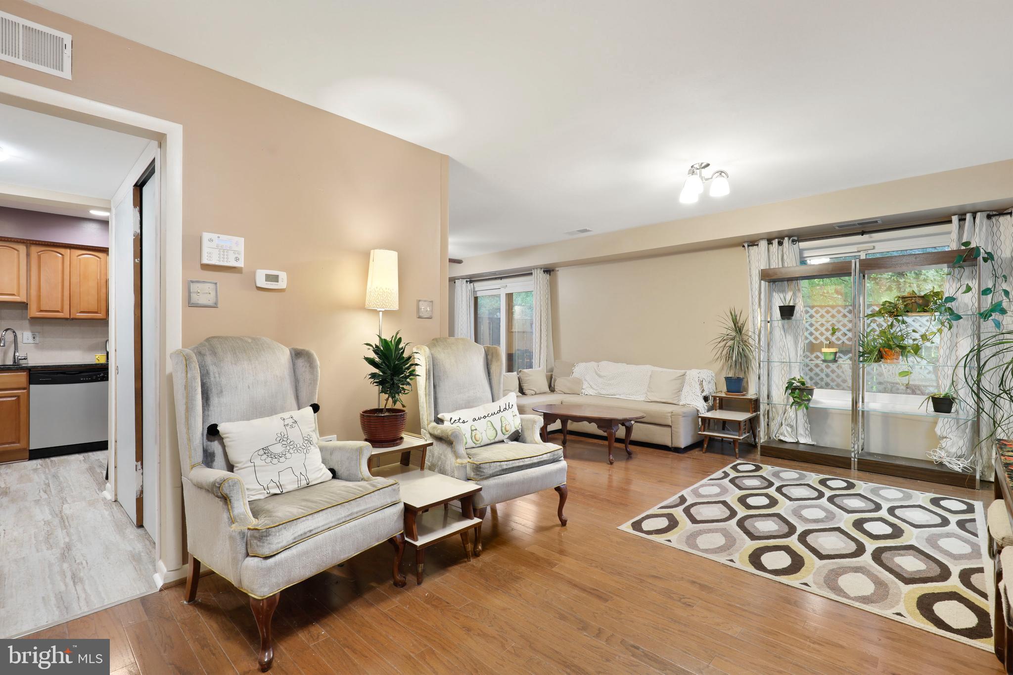 5755 Thunder Hill Road Columbia, MD 21045 - Photo 4 of 32 Hardwood Flooring shines in Living & Dining rooms