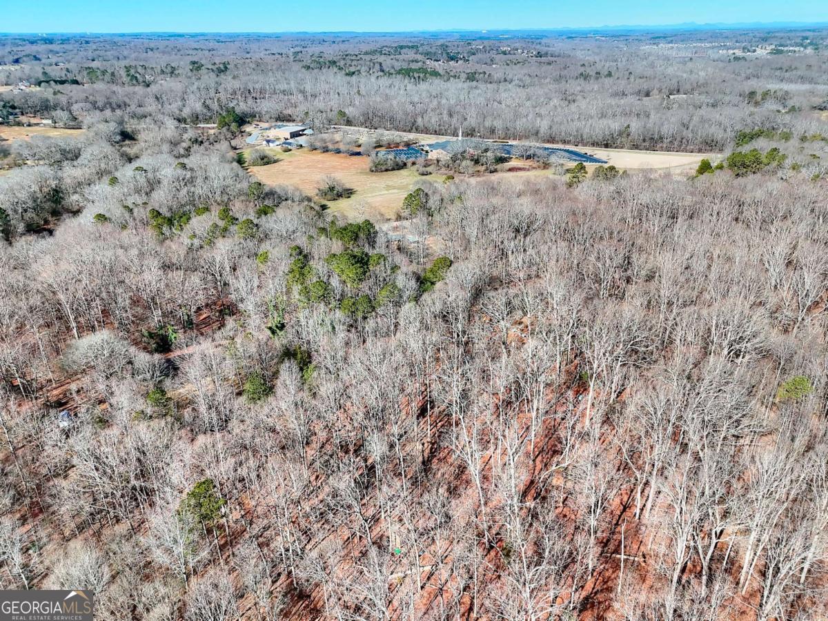1268 Johnson Mill Road Jefferson, GA 30549 - Photo 23 of 28 a view of dirt field and trees