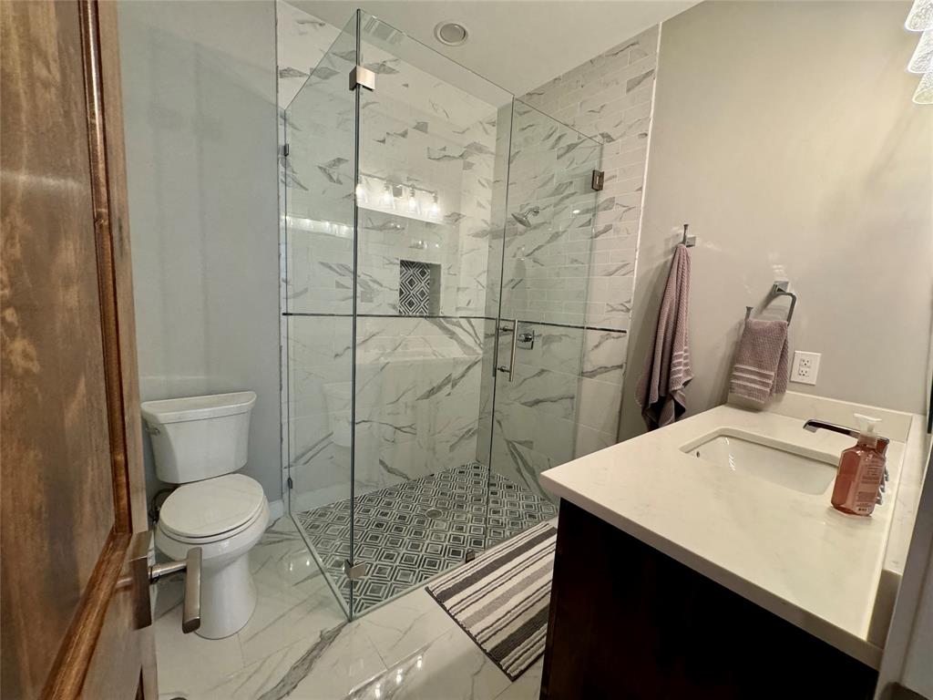 474 Eagle Cove Circle Tioga, TX 76271 - Photo 18 of 25 a bathroom with a sink toilet and shower