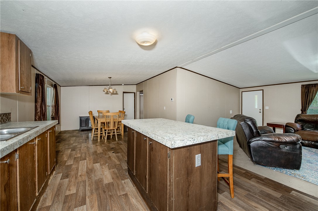 604 Sanders Rd. Lane Franklin, TX 77856 - Photo 40 of 42 a view of a dining room with furniture and wooden floor
