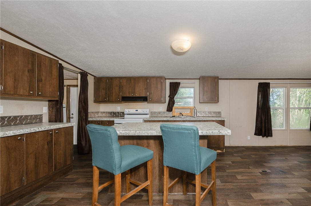 604 Sanders Rd. Lane Franklin, TX 77856 - Photo 2 of 42 a view of a dining room with furniture window and wooden floor