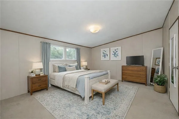 a kitchen with a table chairs stove and cabinets