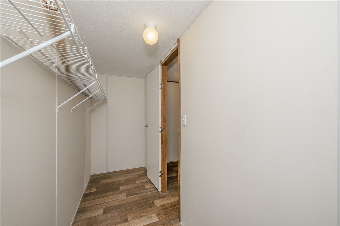 604 Sanders Rd. Lane Franklin, TX 77856 - Photo 21 of 49 Spacious closet featuring dark wood-type flooring