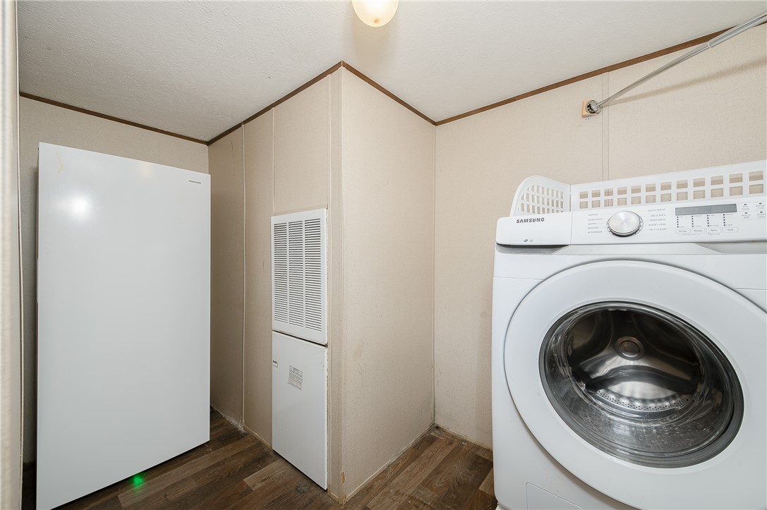 604 Sanders Rd. Lane Franklin, TX 77856 - Photo 25 of 42 a utility room with dryer and washer